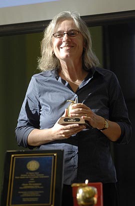 Four social scientists honored for teaching and research