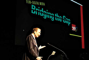 George Blumenthal welcomes the audience and participants to Bridging the Gap.