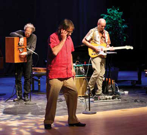 Grateful Dead drummer Mickey Hart, pretending to call late music professor Fred Lieberman during a memorial event in January. 