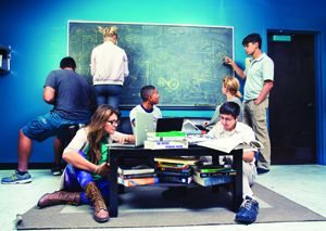 Students work in the SLUG with Enrico Ramirez-Ruiz (far right), professor of astronomy and astrophysics.