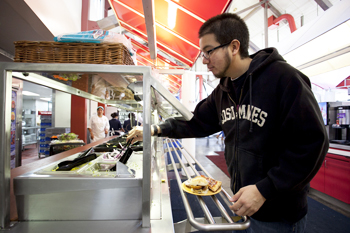 Photo of student and trayless dining