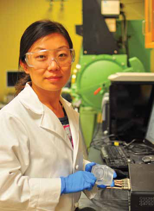 UCSC graduate student Hanyu Wang is first author of the paper describing a novel solar microbial device (below) for generating hydrogen fuel. (Photo by Song Yang)