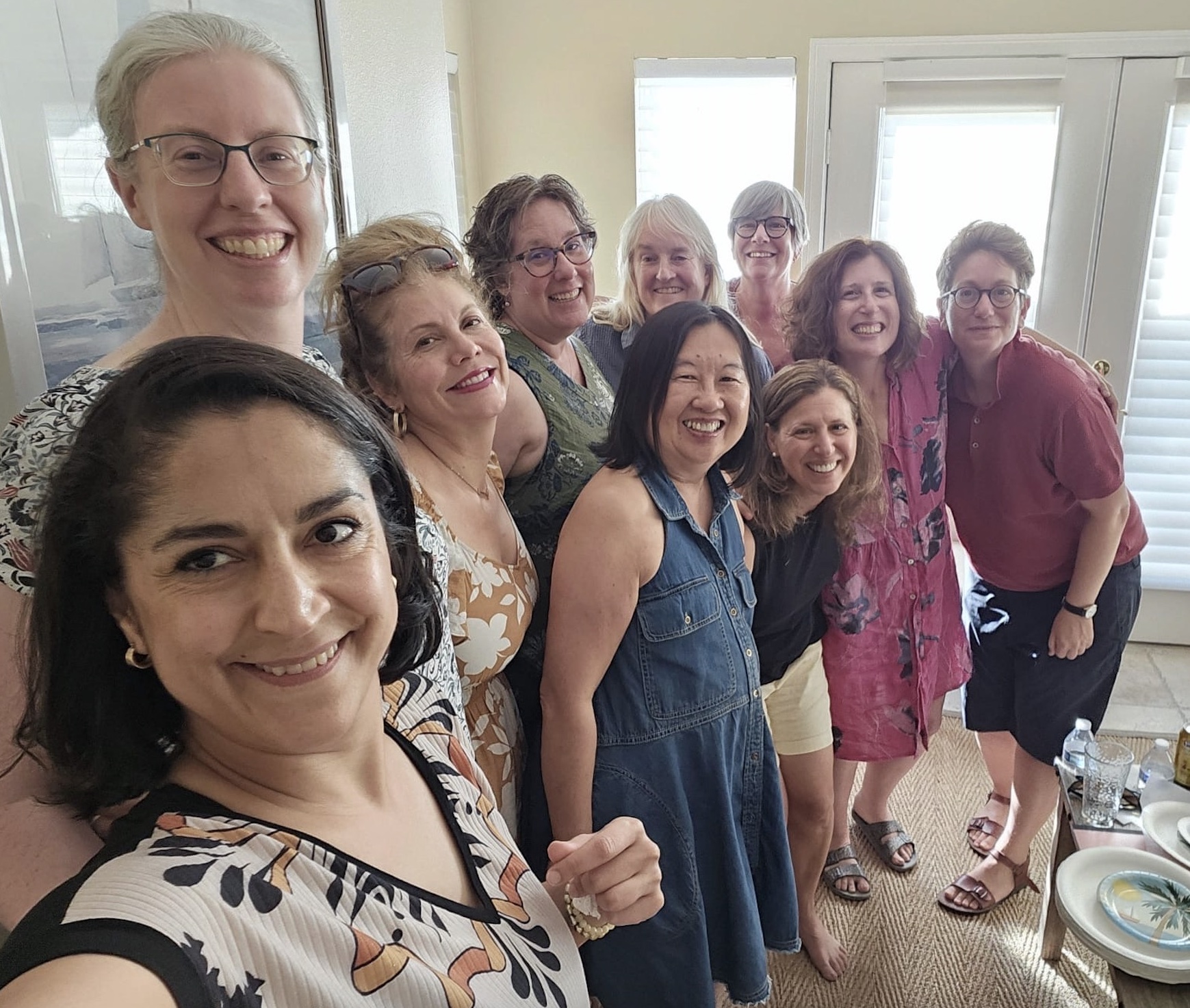Participants in a CoRE retreat smile at the camera