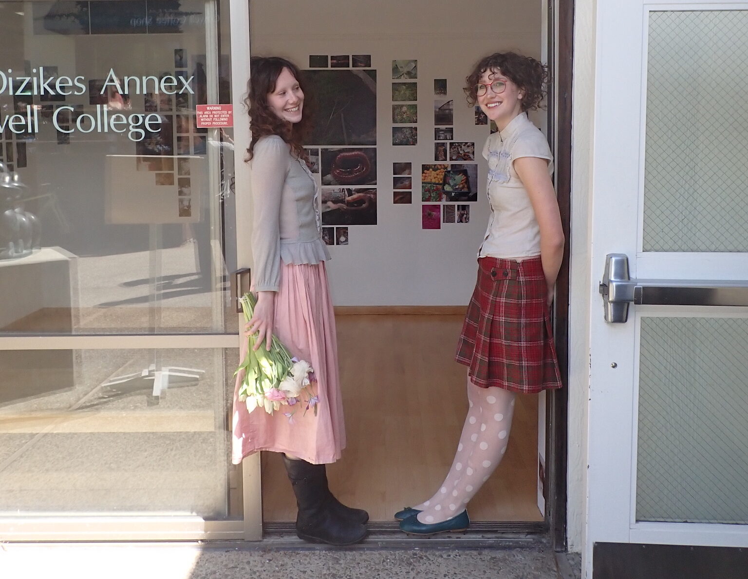 Artist Morgan Yacullo and co-curator Sloane Harris welcome visitors to Circuit, a student-led exhibition exploring UCSC’s food systems and networks of care
