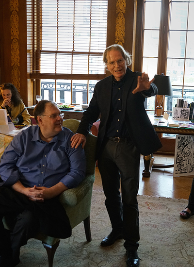 Gregg Barnes (seated) and Jim Gunderson at a 50th anniversary celebration of a production of Julius Casear with costumes designed by comics artist Jack Kirby. Photo courtesy of Jim Gunderson.