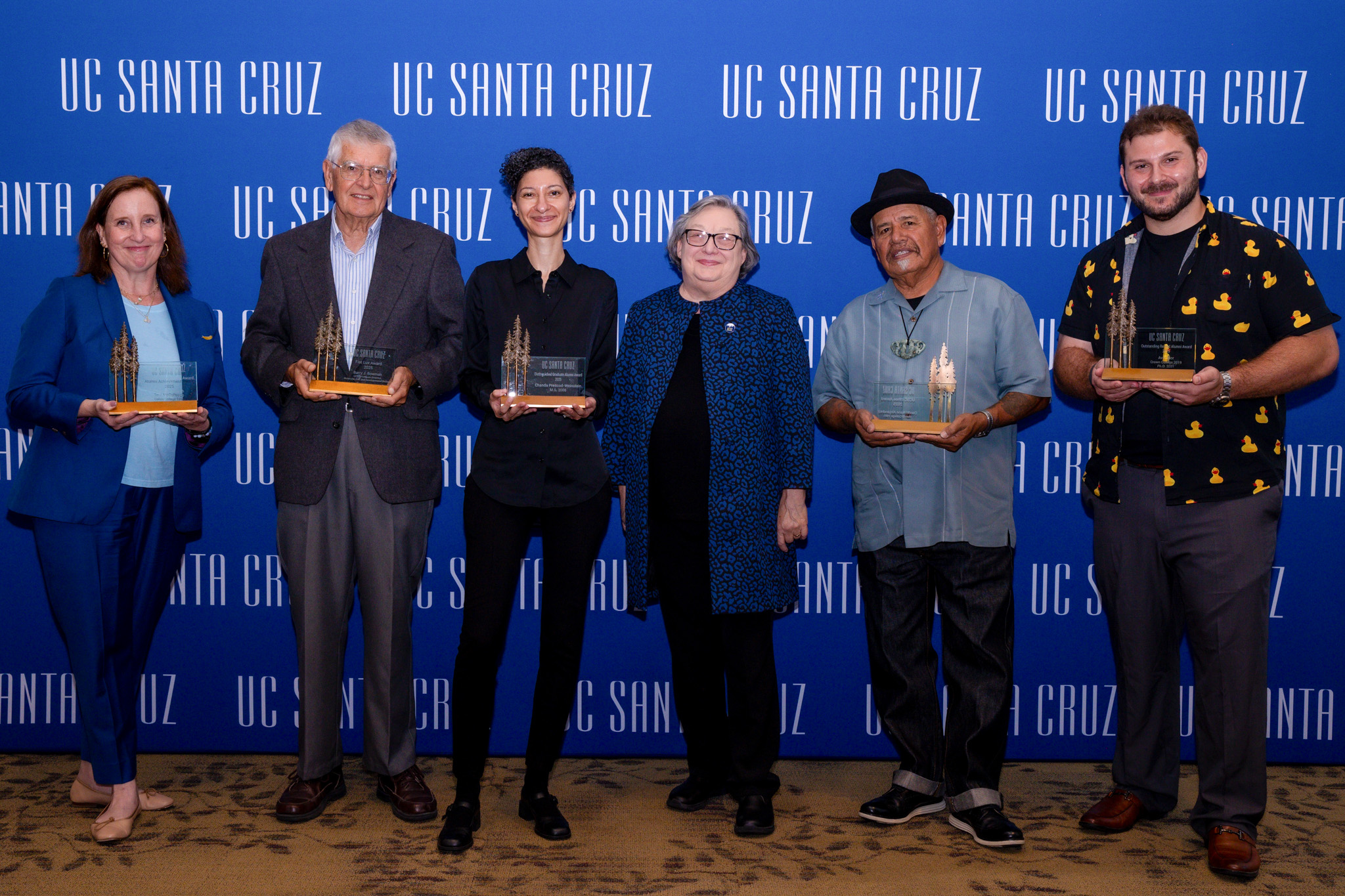 UCSC Alumni Award recipients pose for a photo with UCSC Chancellor.