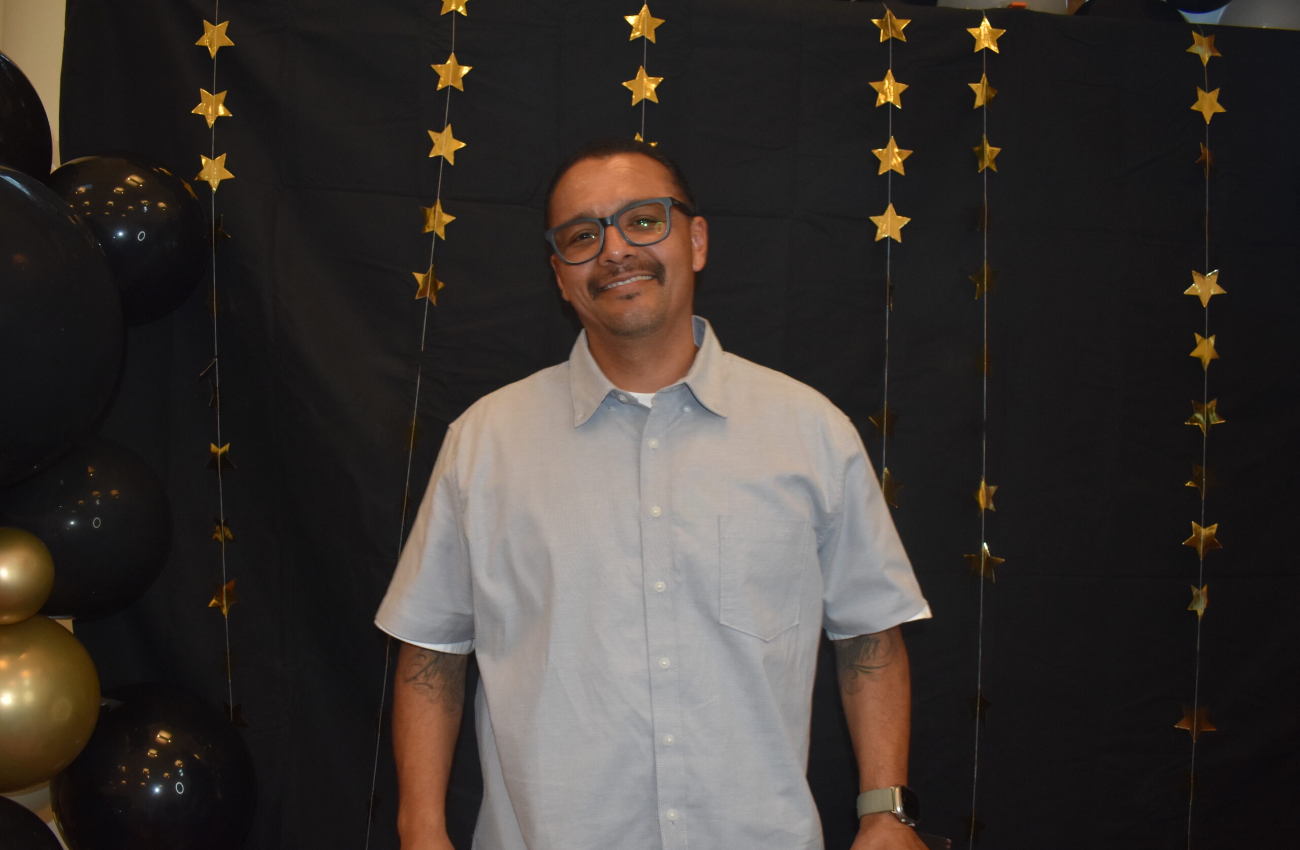 Sammy Chavez poses for a photo