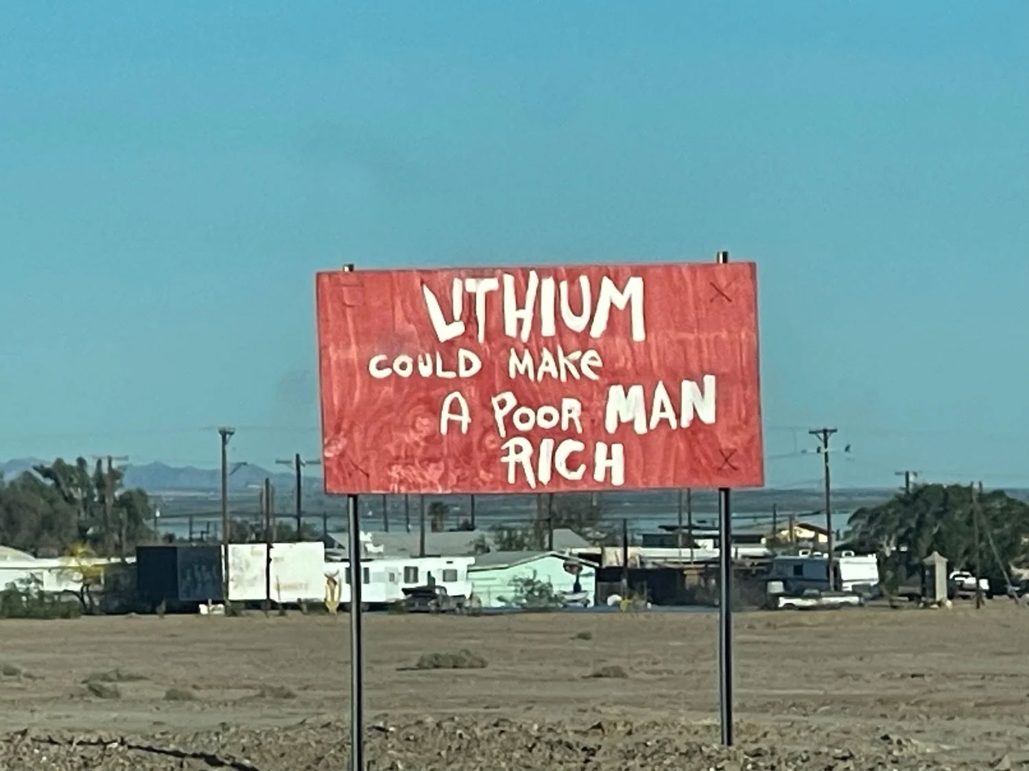 Red road sign: Lithium could make A poor man rich.
