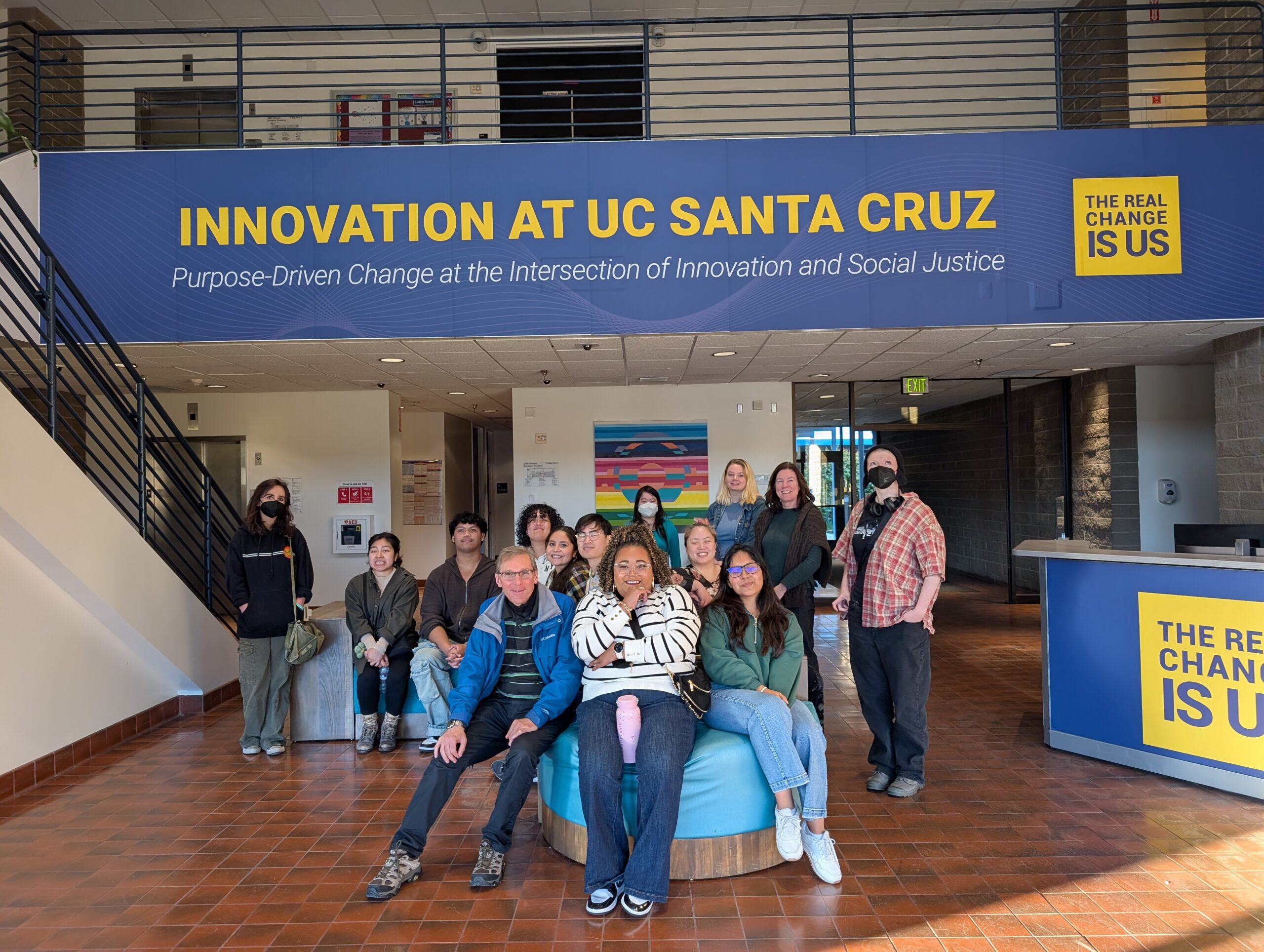A group of Berkeley City College students in an academic building at UC Santa Cruz.