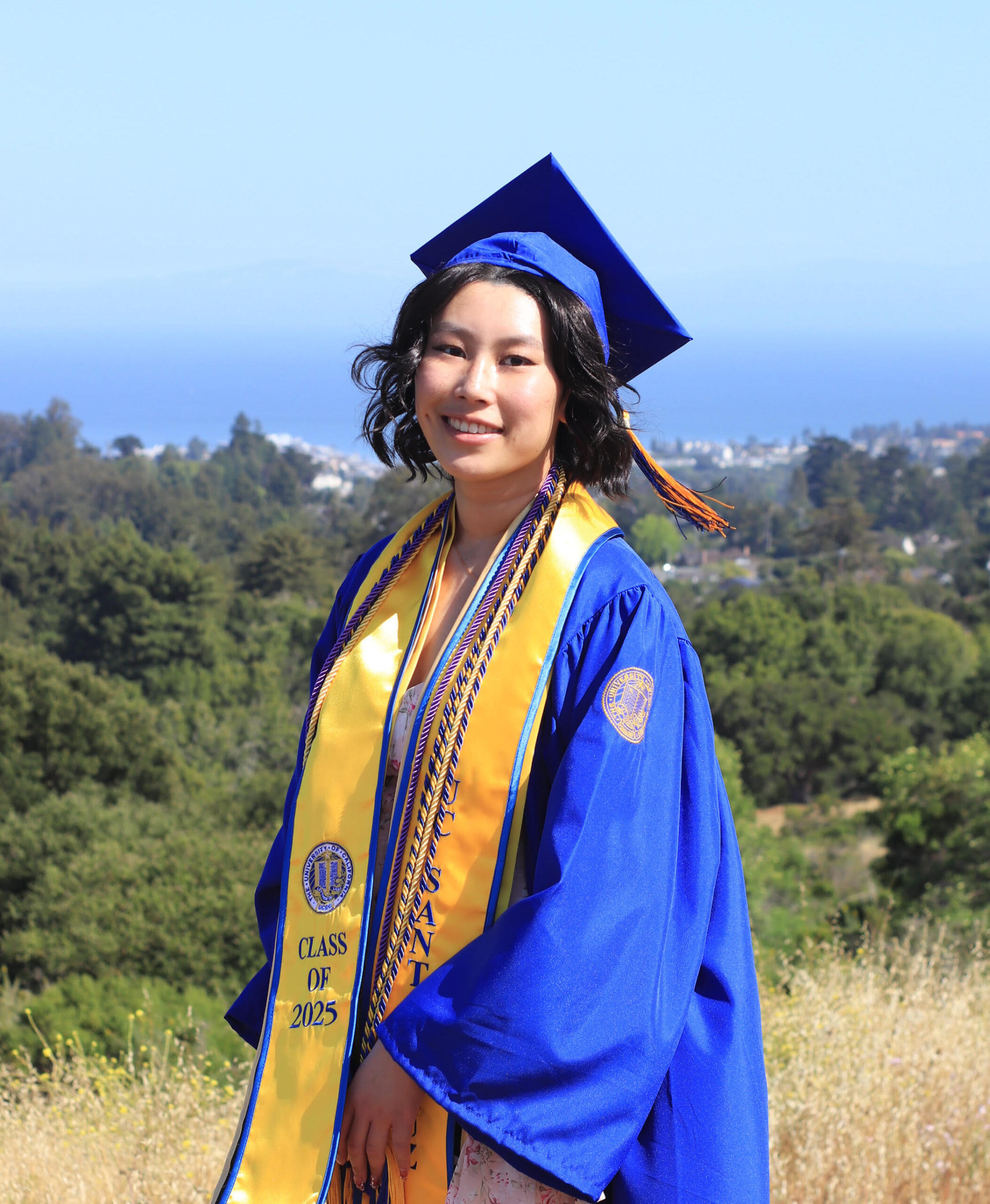 Jennie Lin at UC Santa Cruz in graduation cap and gown