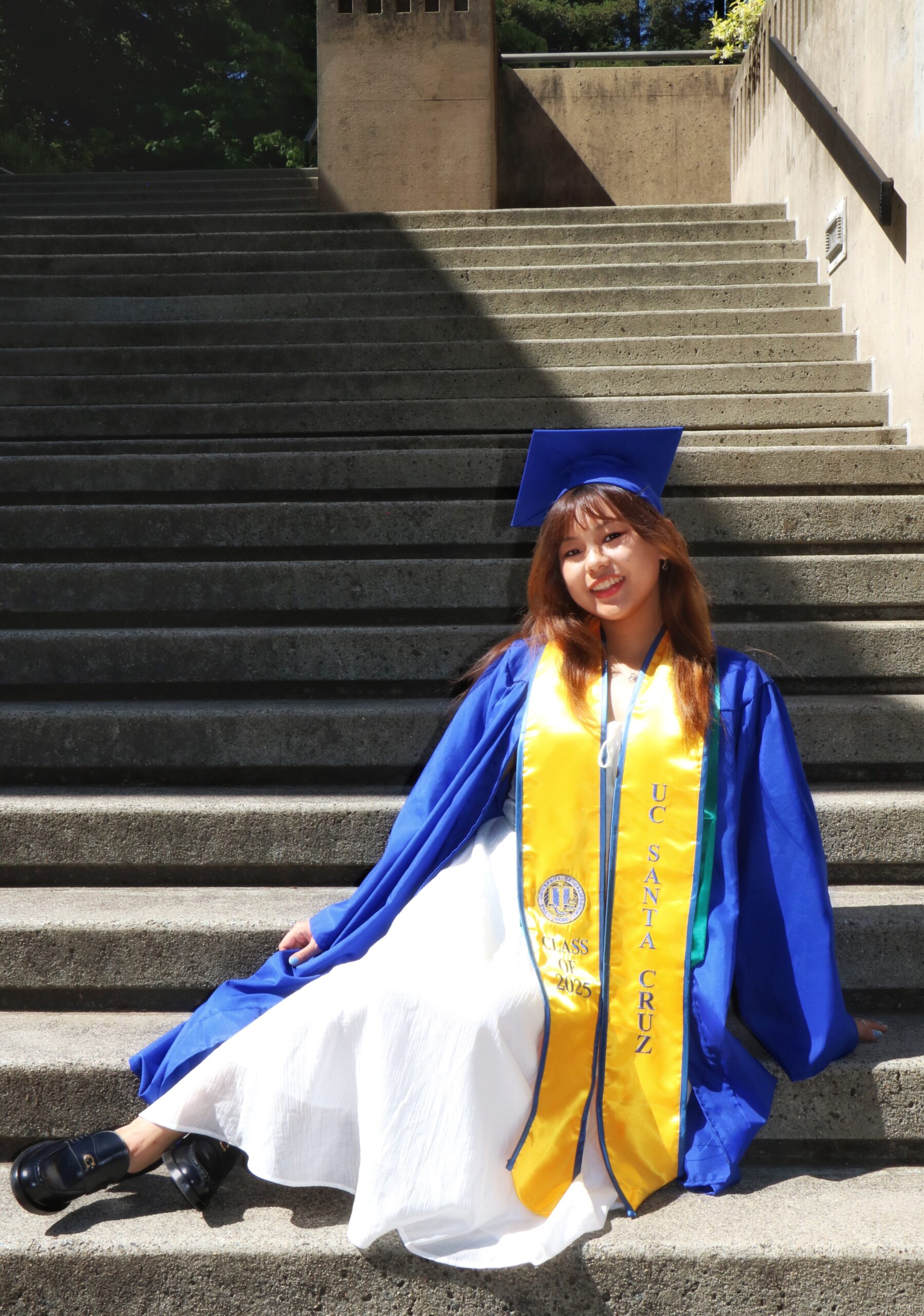 Samantha Chang at UC Santa Cruz in graduation cap and gown.