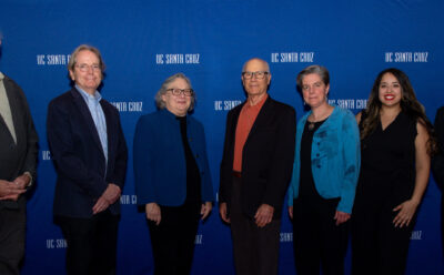 Group photo of the Alumni Award recipients against a 'UC Santa Cruz' backdrop.