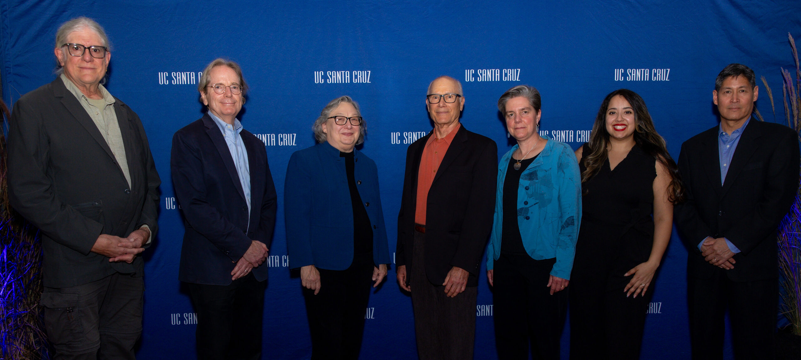 Group photo of the Alumni Award recipients against a 'UC Santa Cruz' backdrop.