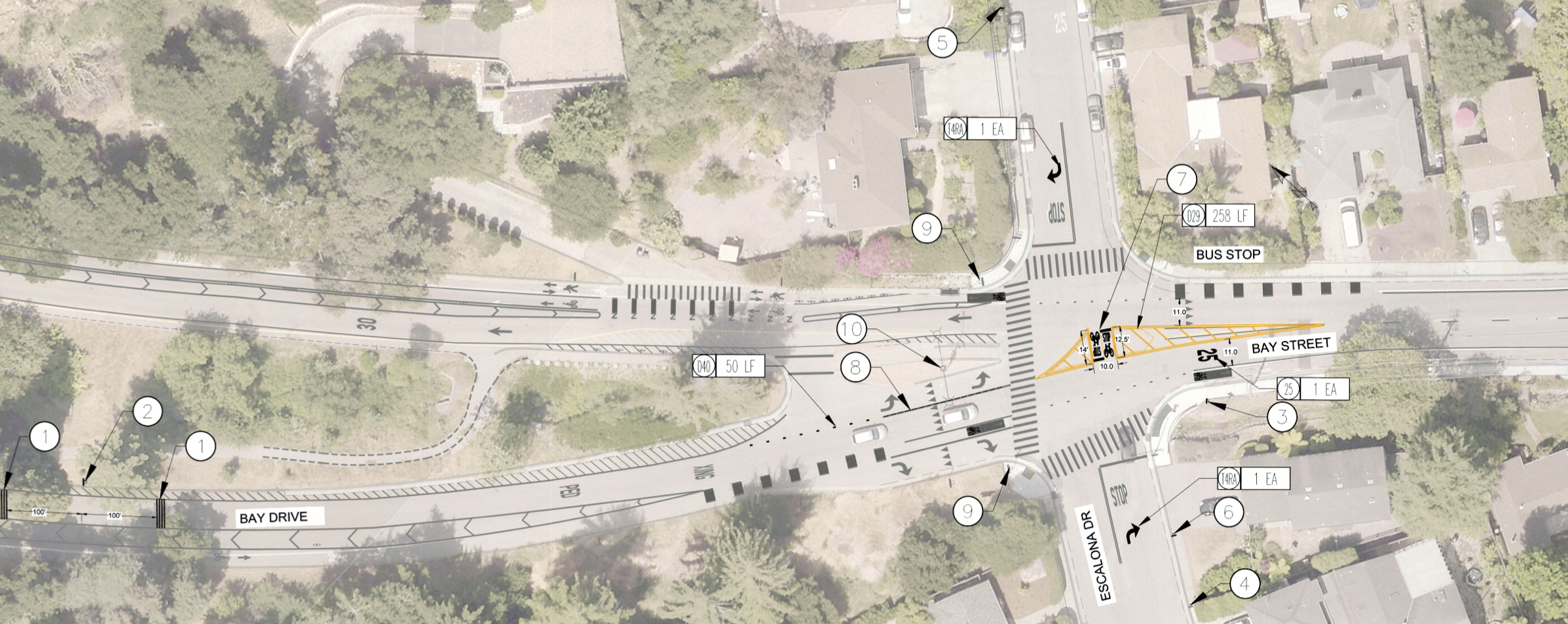 Aerial view of a street intersection shows traffic markings, crosswalks, lane arrows, a bus stop, and labeled construction or planning notes. Streets include Bay Street, Escalona Drive, and Bay Drive.